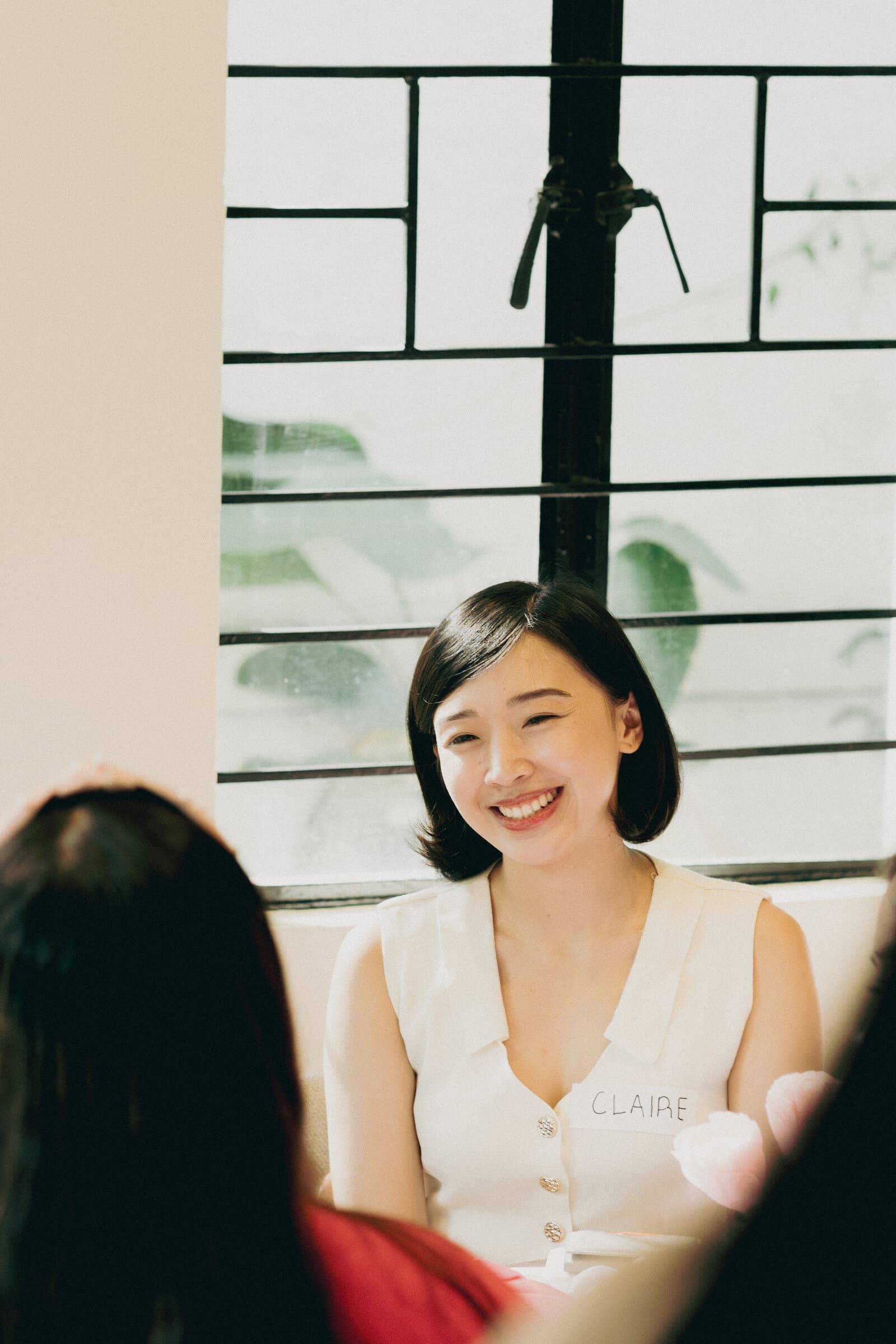 Laughter over coffee at a café table
