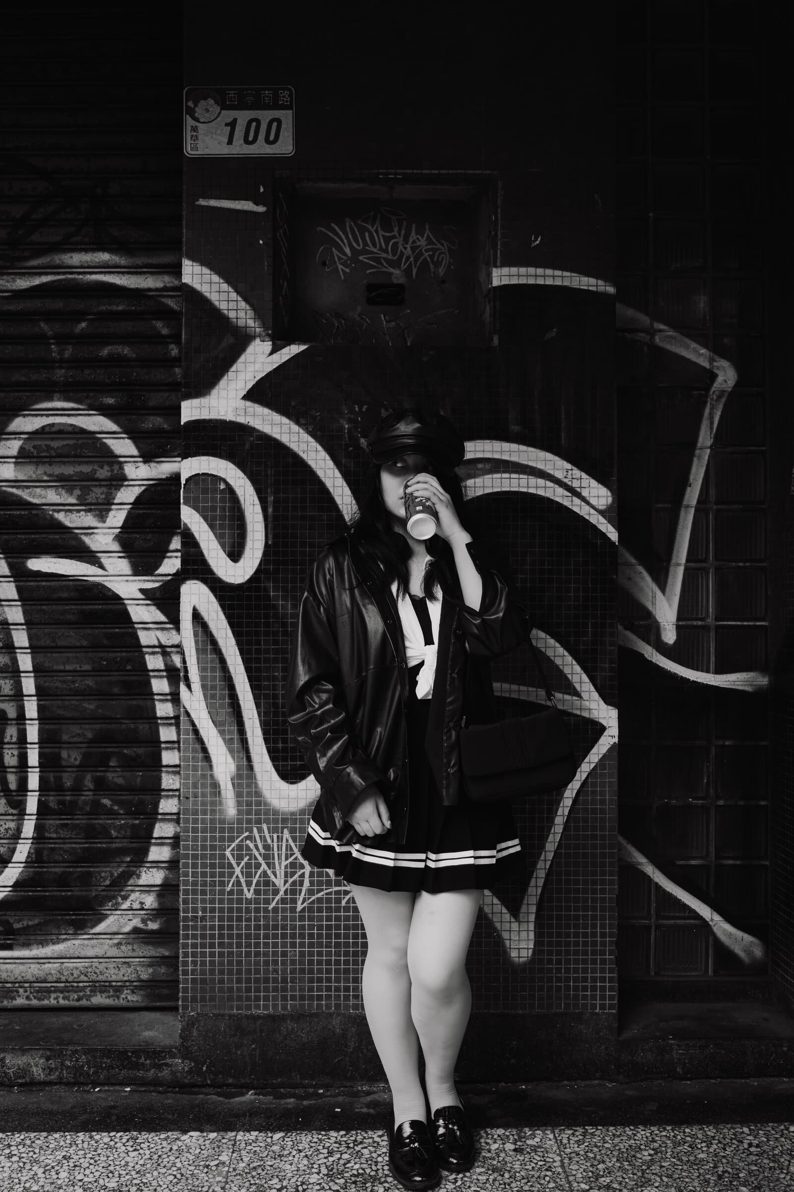 Portrait against a graffiti wall