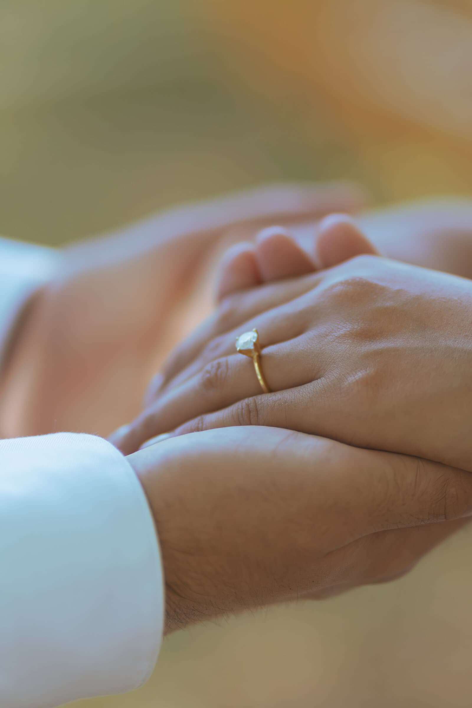 Couple, hands with ring